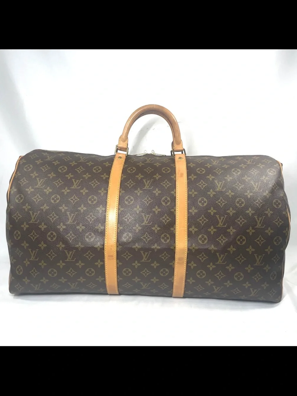 Louis Vuitton Monogram Canvas Duffel with Vachetta Trim in Brown and Tan